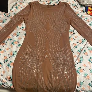 Beige sparkly dress.